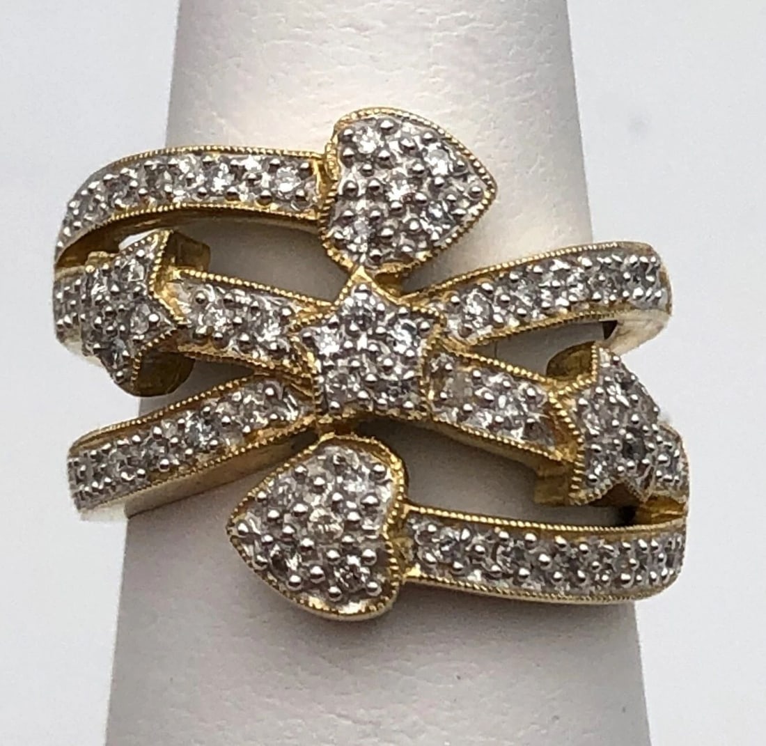 14K GOLD CROSSING HEART AND STAR RING WITH 0.40CTS NATURAL DIAMONDS 8.7 GRAMS: 14k Gold crossing Heart and Star Ring set with 0.40cts of Diamonds Condition: New with original tag. Has been moved around in inventory and has very minor scuffs/scratches due to this. Brand new never