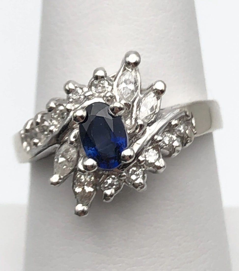 14K WHITE GOLD RING WITH NATURAL SAPPHIRE AND 0.55CTS DIAMONDS SIZE: 8: 14k White Gold Ring with natural Sapphire and 0.55cts of Diamonds Condition: Used, Display Model, has been cleaned Material: 14k White Gold Ring Size: 8 Weight: 4.6 grams Top Width: 13mm Bottom Width: