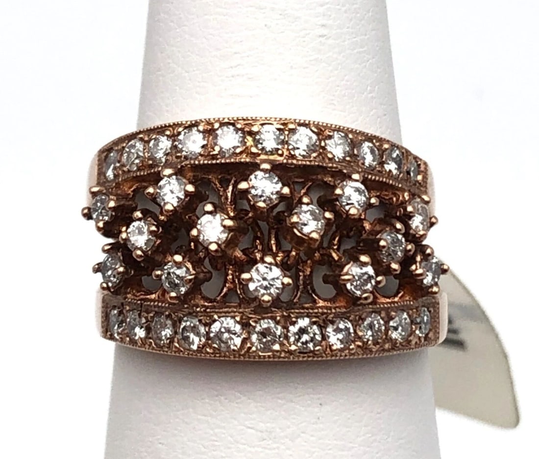 NEW 14K ROSE GOLD INTER WEAVED DOUBLE RING WITH 0.95CTS DIAMONDS SIZE: 7.25: 14k Rose Gold Inter weaved double Ring set with 0.95cts of Diamonds Condition: New with tag, has been moved around in inventory. Has very few light/minor scratches due to this. Never been worn. Materi