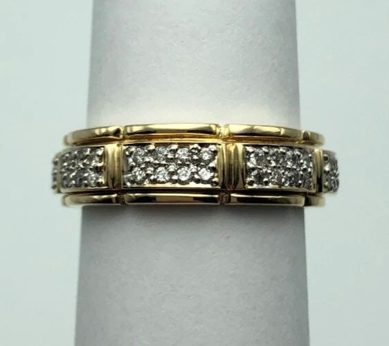14K GOLD AND 0.55CTW DIAMOND ETERNITY SPINNING BAND (SIZE: 7) 7.4 GRAMS: 14K GOLD AND DIAMOND ETERNITY SPINNING BAND (SIZE: 7) 14k Gold Eternity Spinning Band You are bidding on a 14k Gold Eternity Spinning Band. The ring has been fully checked and inspected by our in hous