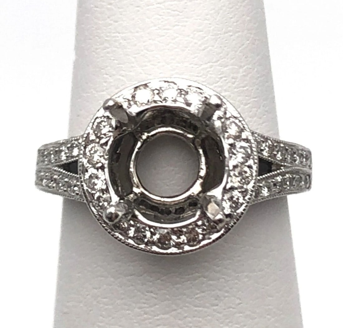 18K WHITE GOLD HALO SEMI MOUNT WITH 0.61CTS OF DIAMONDS SIZE: 4.5: 18K WHITE GOLD HALO SEMI MOUNT WITH 0.61CTS OF DIAMONDS SIZE: 4.5 18k White Gold Semi mount with 0.61cts of Diamonds You are bidding on a 18k White Gold Semi mount with 0.61cts of Diamonds . The piece