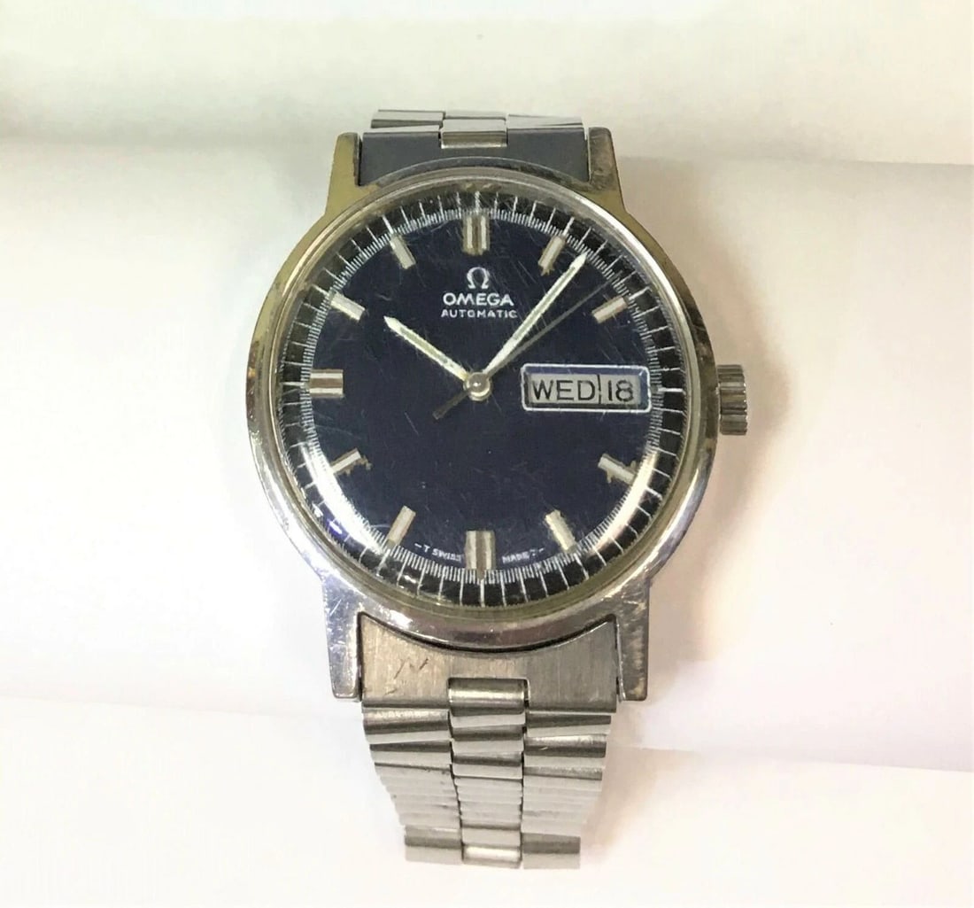 RARE 1970'S OMEGA AUTOMATIC WATCH DAY DATE 1660140 CAL 750: RARE 1970'S OMEGA AUTOMATIC WATCH DAY DATE 1660140 CAL 750 Rare 1970's Omega Automatic Watch Day Date 1660140 Cal 750 You are bidding on a Rare 1970's Omega Automatic Watch Day Date 1660140 Cal 750. W