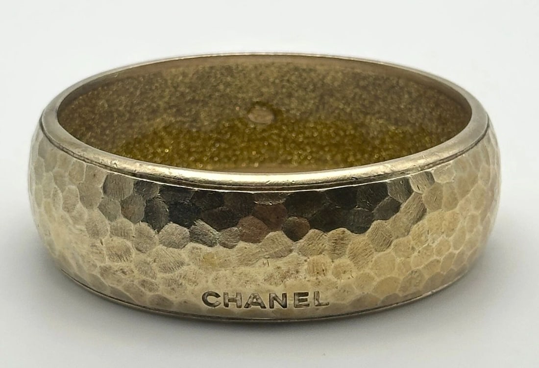 CHANEL BANGLE WITH OUTER HAMMER FINISH AND INNER RHINESTONE LAYER (1 of 2)