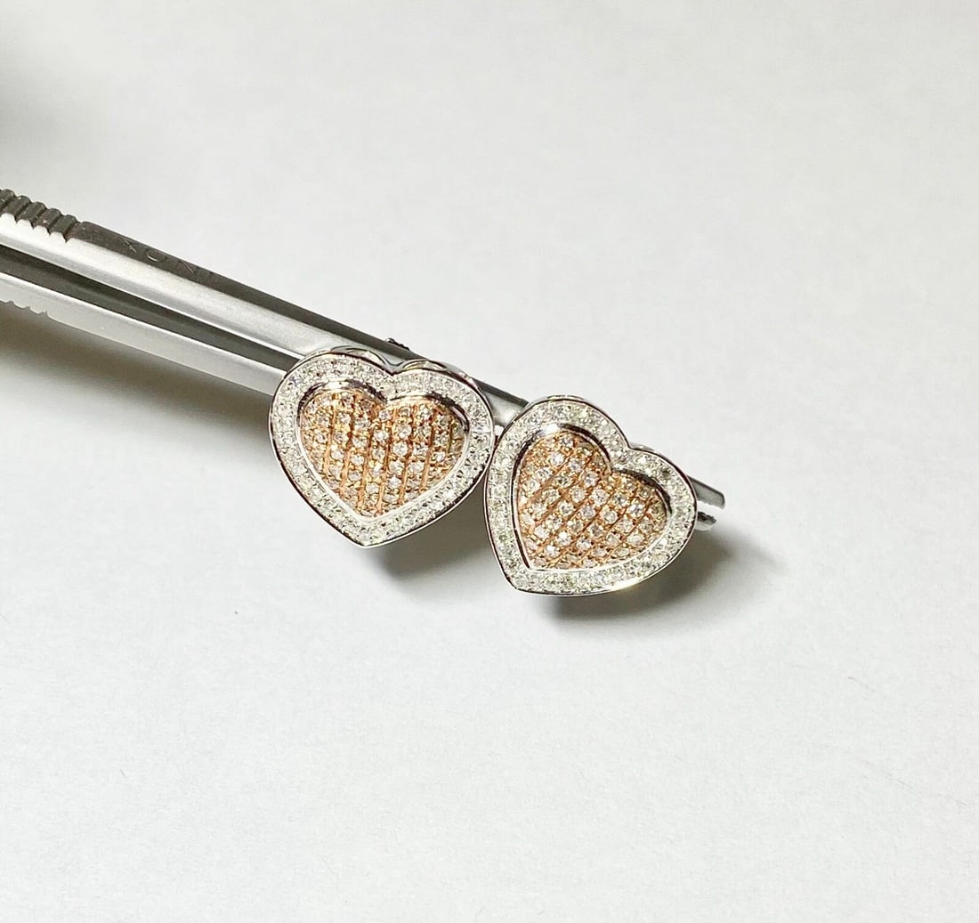 10K GOLD 2 TONE WHITE/ROSE HEART SHAPED EARRINGS WITH 0.80CTS DIAMONDS: 10k Gold 2 tone white/rose Heart Shaped Earrings with 0.80CTS Diamonds You are bidding on a new with tags 10k Gold 2 tone white/rose Heart Shaped Earrings with 0.80CTS Diamonds. The earrings have mino