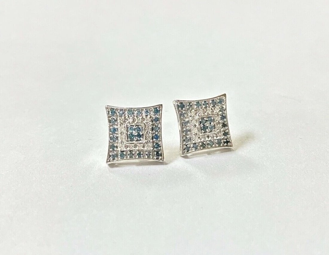 14K WHITE GOLD EARRINGS WITH 1.20CT BLUE AND WHITE DIAMONDS: 14K WHITE GOLD EARRINGS WITH 1.20CT BLUE AND WHITE DIAMONDS 14k White Gold Earrings with 1.20CT Blue and White Diamonds You are bidding on a new with tags 14k White Gold Earrings with 1.20CT Blue and