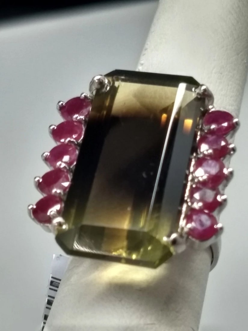 14K WHITE GOLD RING WITH 25CT CITRINE AND 2.5CTS RUBY 9.3 GRAMS: 14K WHITE GOLD CITRINE AND RUBY RING 14k White Gold Citrine and Ruby Ring You are bidding on a 14k white gold ring with citrine and rubies. The ring is new but has small marks and scratches on the