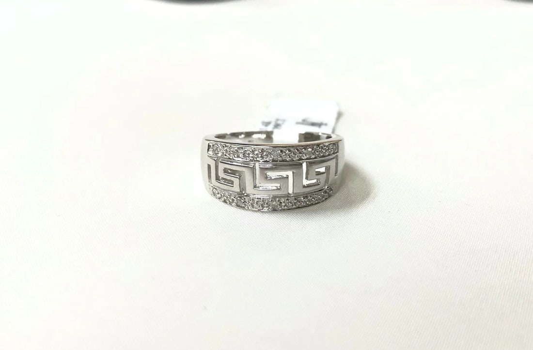 MEN'S 14K WHITE GOLD RING WITH DIAMONDS, GREEK DESIGN: Men's 14k White Gold Ring With Diamonds, Greek Design You are bidding on a new with defects Men's 14k White Gold Ring With Diamonds, Greek Design. The ring has minor scuffs and scratches from being mo