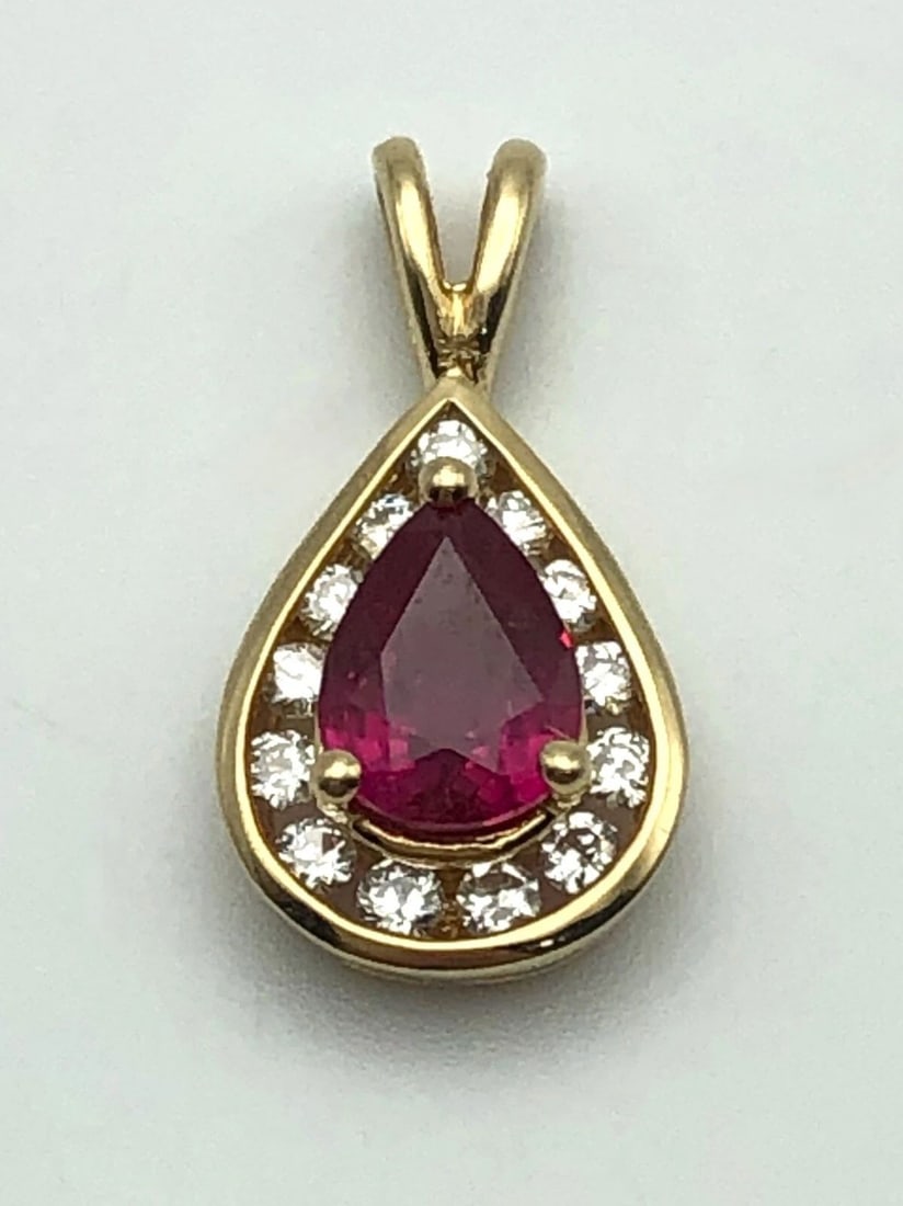 14K GOLD PEAR SHAPED PENDANT WITH NATURAL RUBY AND 0.26CTS OF DIAMONDS 1.3G (1 of 2)