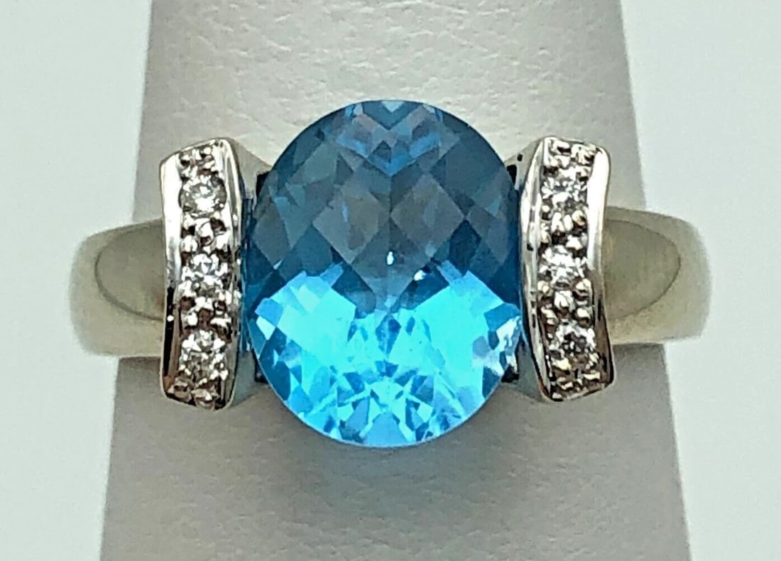 14K WHITE GOLD RING SET WITH BLUE TOPAZ AND 0.06CTS OF DIAMONDS SIZE: 7 5.9G (1 of 2)