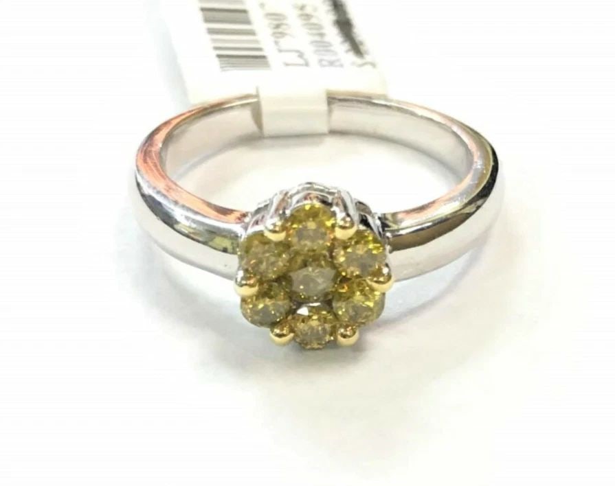 14K WHITE GOLD RING CLUSTER WITH 0.55CTS OF YELLOW DIAMONDS SIZE: 6.5 4.3G: 14K WHITE GOLD RING FLOWER STYLE WITH YELLOW DIAMONDS (SIZE: 6.5) 14k White Gold Ring Flower Style with Yellow Diamonds You are bidding on a 14k White Gold Ring Flower Style with Yellow Diamonds. Ther
