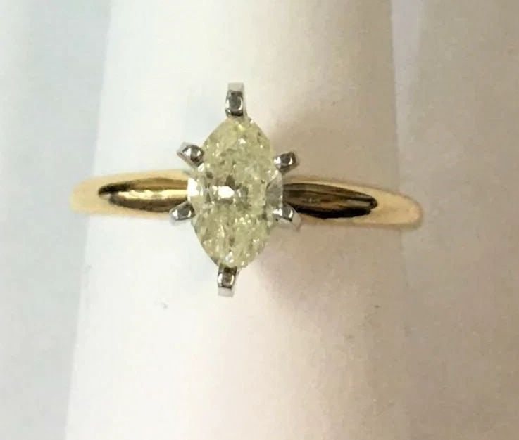 14K GOLD MARQUISE CUT SOLITAIRE DIAMOND RING 0.85CTS: 14K GOLD MARQUISE CUT SOLITAIRE DIAMOND RING 0.85CTS 14k Gold Marquise cut solitaire diamond ring 0.85cts You are bidding on a 14k Gold Marquise cut solitaire diamond ring 0.85cts . The ring has the b