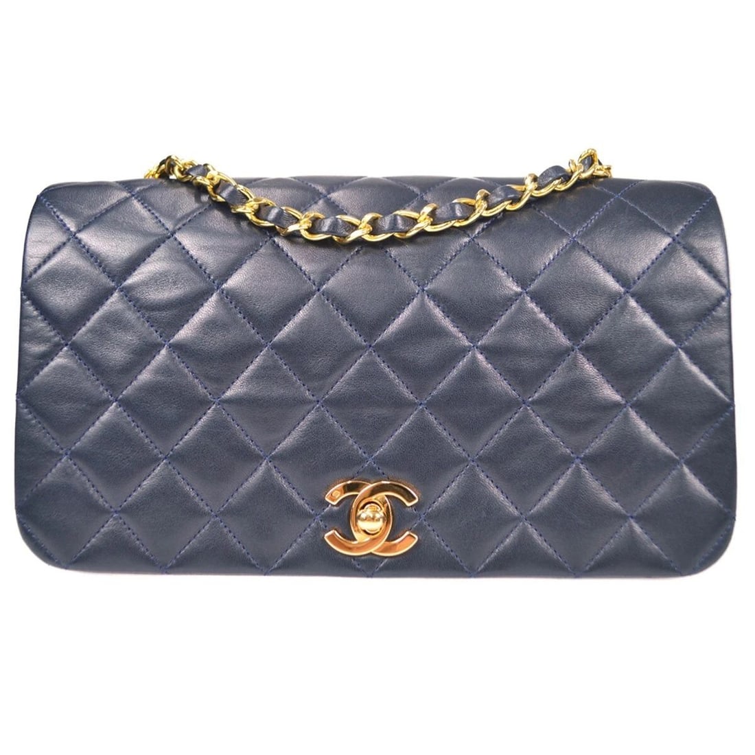 CHANEL NAVY LAMBSKIN FULL FLAP CHAIN SHOULDER BAG: CHANEL NAVY LAMBSKIN FULL FLAP CHAIN SHOULDER BAG Chanel Full Flap Chain Shoulder Bag Description OUTSIDE: A+: VERY GOOD CONDITION!! INSIDE: A+: VERY GOOD CONDITION!! Scuff on flap. The edge of the po