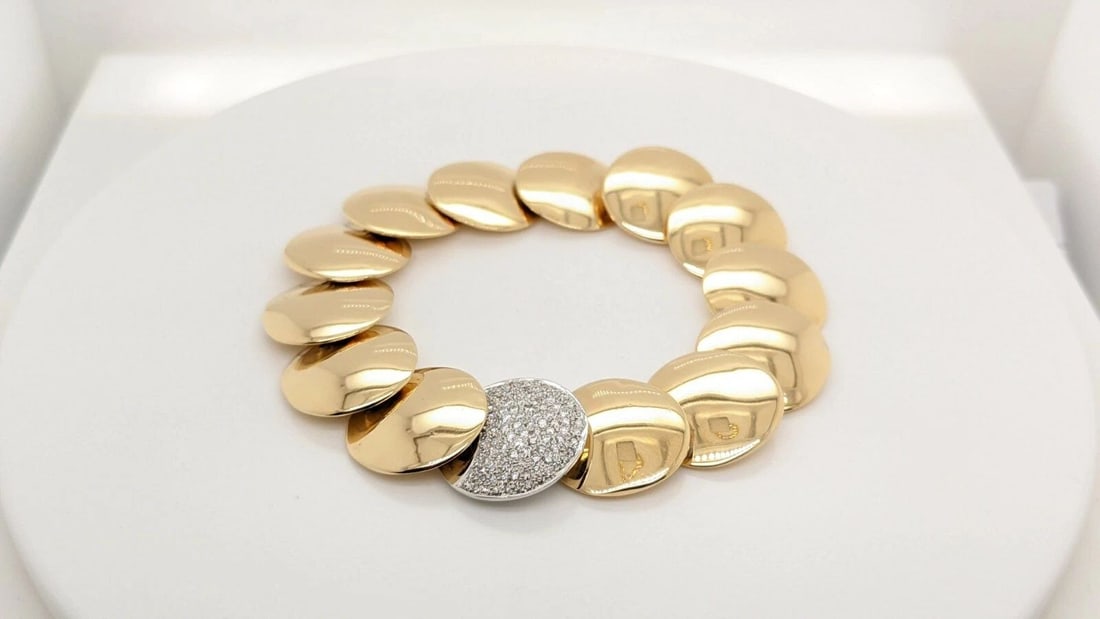 1981 TIFFANY & CO. 18K YELLOW GOLD PLATINUM DIAMOND DISC BRACELET 7.25" LONG: 1981 Tiffany & Co. 18K Yellow Gold Platinum Pave Diamond Disc Bracelet Length - 7.25" Long Total Weight - 53.4 Grams Professionally Polished & Looks Brand New Pouch Included **Hallmarks Slight Faded f