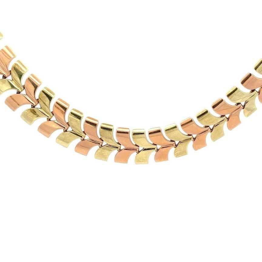 TIFFANY & CO. VINTAGE 14K YELLOW ROSE GOLD WING LINK COLLAR NECKLACE: TIFFANY & CO. VINTAGE 14K YELLOW ROSE GOLD WING LINK COLLAR NECKLACE This gorgeous collar necklace is authentic by Tiffany & Co. It is vintage and crafted from 14k yellow and rose gold featuring 17.45