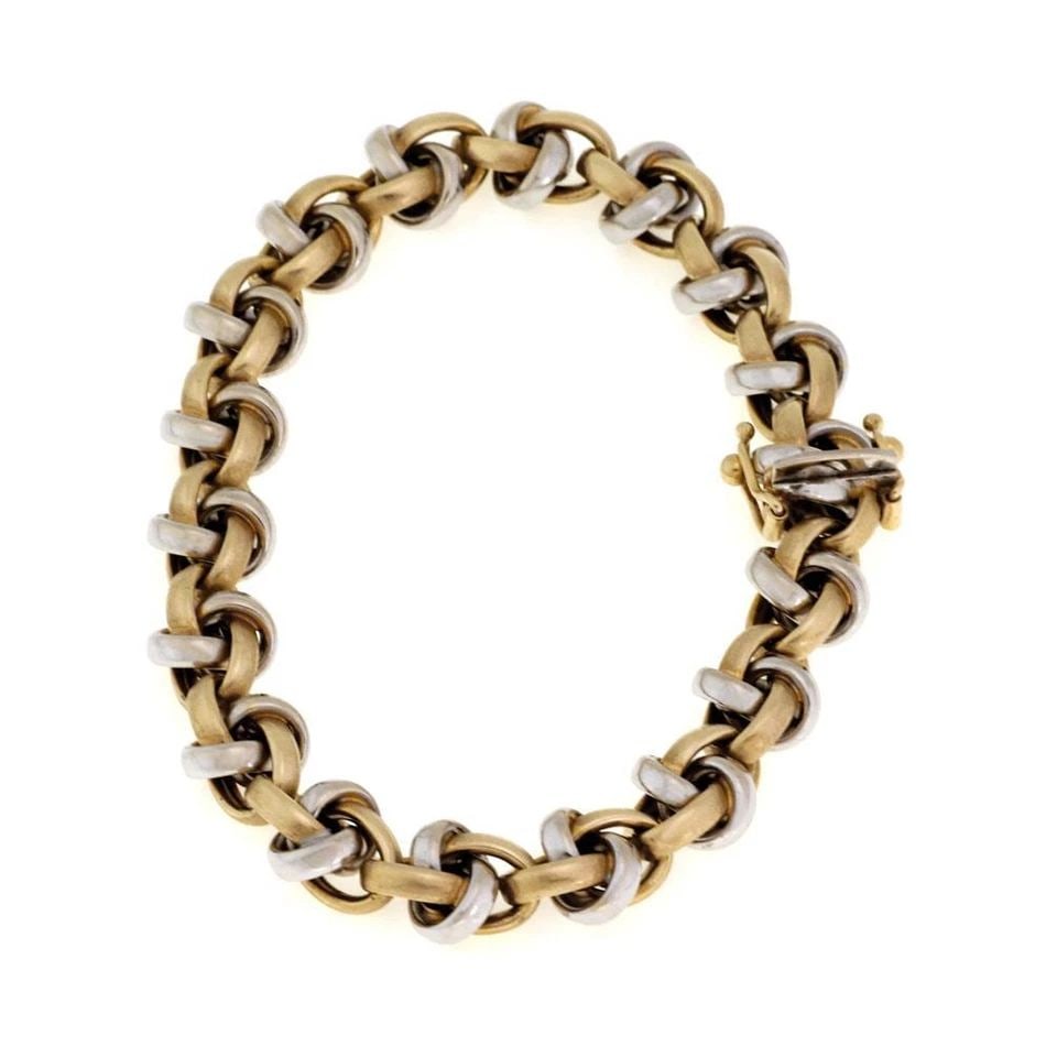 14K BRACELET TWO TONE GOLD FANCY DOUBLE INTERLACE LINK 7.5" L: 14K BRACELET TWO TONE GOLD FANCY DOUBLE INTERLACE LINK 7.5" L 14k Two Tone Gold Fancy Double Interlace Link Bracelet 7.5" Description This is a lovely 14k yellow and white gold bracelet featuring a po