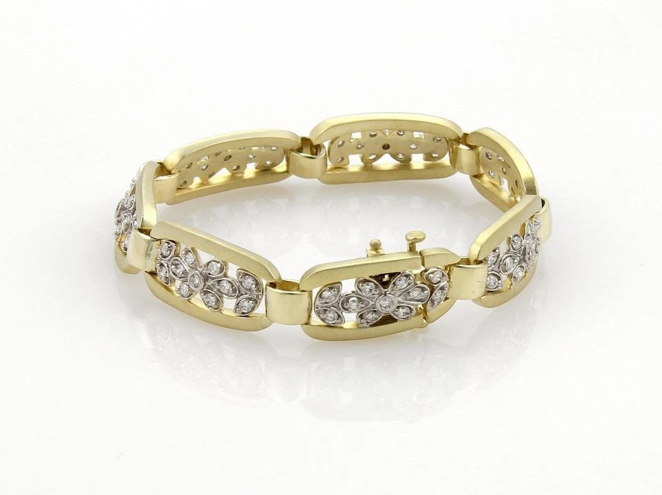 DIAMOND GOLD FLORAL BRACELET 14K TWO TONE LONG OPEN STYLE LINKS VINTAGE: DIAMOND GOLD FLORAL BRACELET 14K TWO TONE LONG OPEN STYLE LINKS VINTAGE This is a beautiful vintage bracelet, it is crafted from 14k yellow and white gold featuring long open yellow gold bar links in 