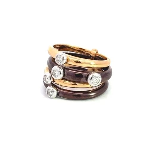 MATTIOLI TIBET STACK RINGS 18K MULTICOLOR GOLD 4 RINGS: MATTIOLI TIBET STACK RINGS 18K MULTICOLOR GOLD 4 RINGS This authentic chic four stack band ring is by designer Mattioli, it is crafted from 18k yellow and bronze color gold with a polished finish and 