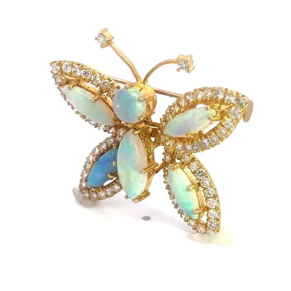 HAMMERMAN BROTHERS GOLD OPAL BROOCH BUTTERFLY DIAMOND 18K YELLOW: HAMMERMAN BROTHERS GOLD OPAL BROOCH BUTTERFLY DIAMOND 18K YELLOW This adorable brooch is by designer Hammerman Brothers, it features a beautiful butterfly pin in 18k yellow gold with natural white pro
