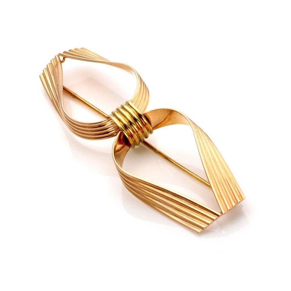 CARTIER VINTAGE 14K YELLOW & ROSE GOLD FANCY RIBBED STYLE LONG BROOCH: CARTIER VINTAGE 14K YELLOW & ROSE GOLD FANCY RIBBED STYLE LONG BROOCH Cartier Vintage 14k Yellow & Rose Gold Fancy Ribbed Style Long Brooch Description This is a vintage authentic brooch by Cartier, i