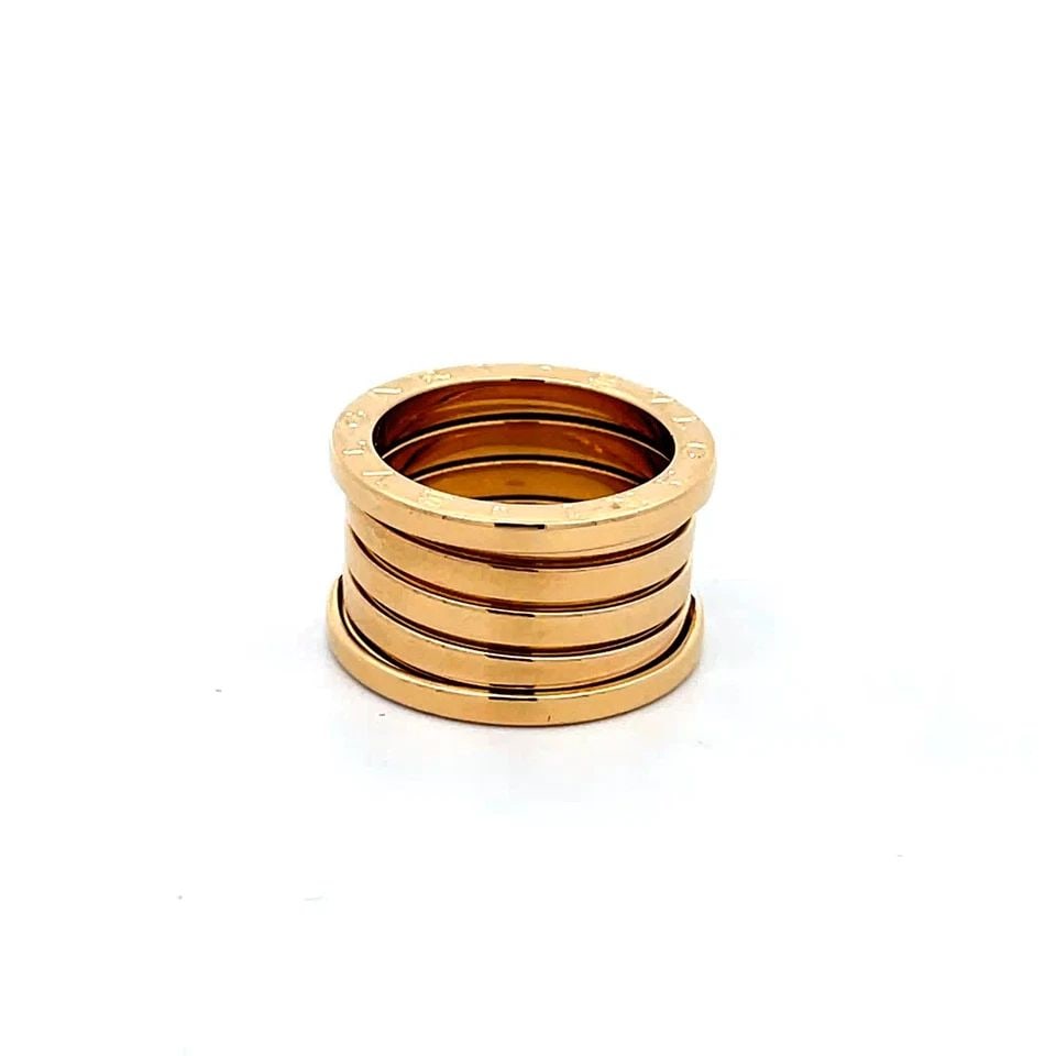 BVLGARI B.ZERO 1 WIDE 18K YELLOW GOLD 4 ROW SPIRAL BAND RING SIZE 5.75: BVLGARI B.ZERO 1 WIDE 18K YELLOW GOLD 4 ROW SPIRAL BAND RING SIZE 5.75 This chic authentic Bulgari wide band ring is finely crafted from 18k yellow gold. It comes from Bvlgari popular B. Zero 1 Collec
