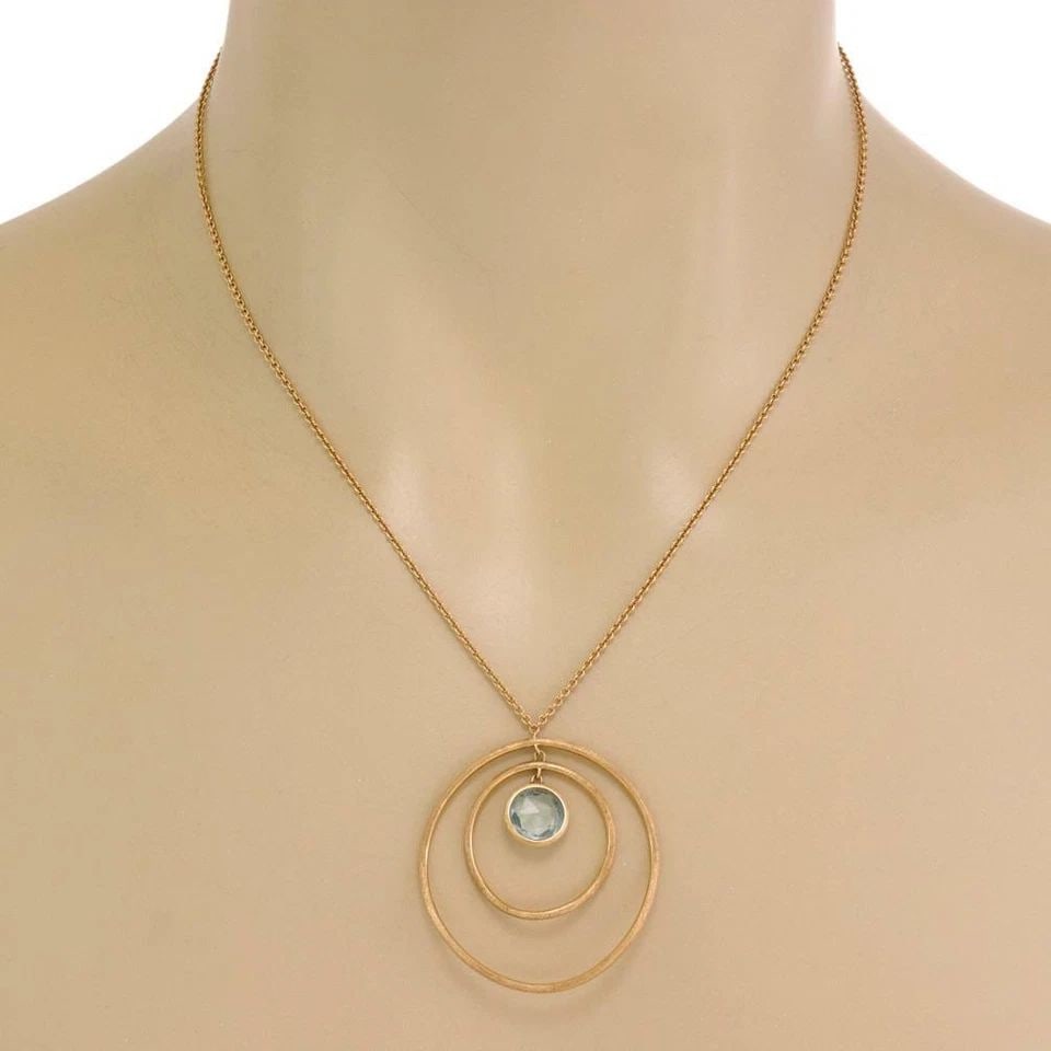 MARCO BICEGO JAIPUR 18K YELLOW GOLD DOUBLE RING PENDANT CHAIN: MARCO BICEGO JAIPUR 18K YELLOW GOLD DOUBLE RING PENDANT CHAIN Marco Bicego Jaipur 18k Yellow Gold Double Ring Pendant Chain Description This lovely authentic pendant and chain are by designer Marco Bi