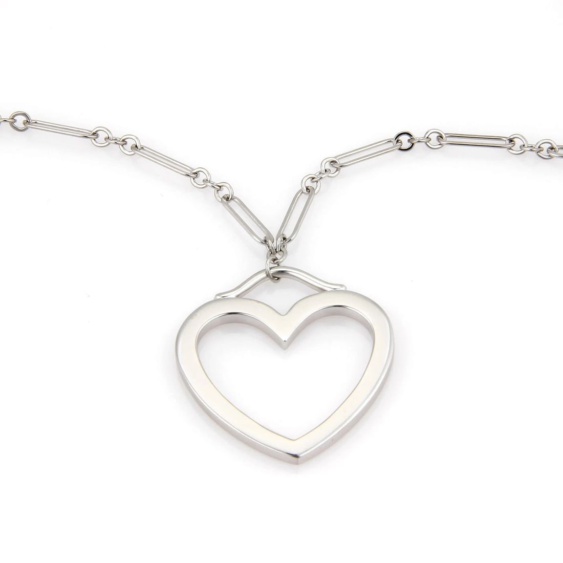 TIFFANY & CO. HEART GOLD NECKLACE 18K WHITE LARGE PENDANT: TIFFANY & CO. HEART GOLD NECKLACE 18K WHITE LARGE PENDANT The Tiffany & Co. Heart Gold Necklace is a stunning piece of fine jewelry featuring a large pendant in the shape of an open heart, made from 1