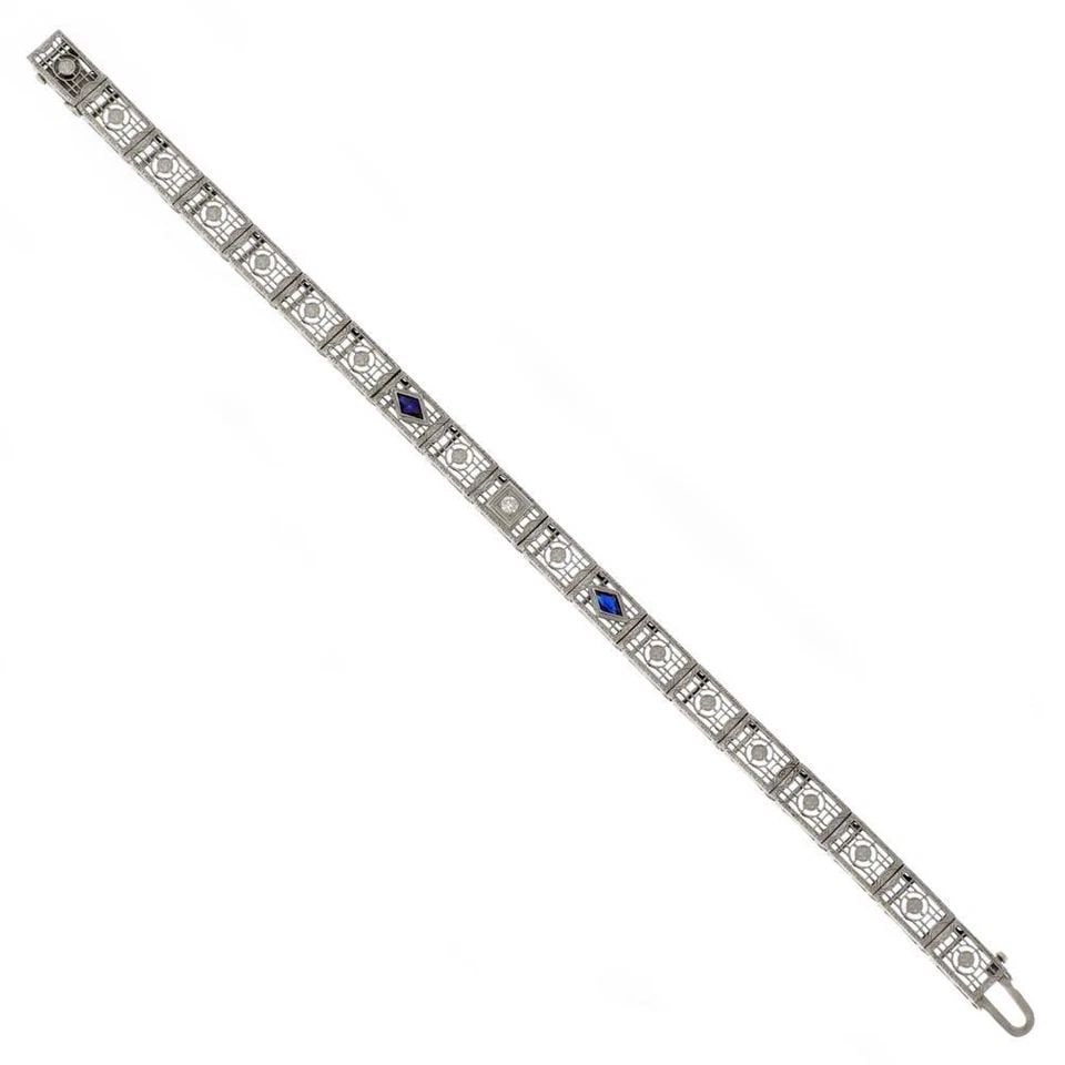 ART DECO DIAMOND PLATINUM 14K GOLD RECTANGLE GATE LINK BRACELET: ART DECO DIAMOND PLATINUM 14K GOLD RECTANGLE GATE LINK BRACELET Art Deco Diamond Platinum 14k Gold Rectangle Gate Link Bracelet Description This lovely Art Deco bracelet has platinum top with 14k whit