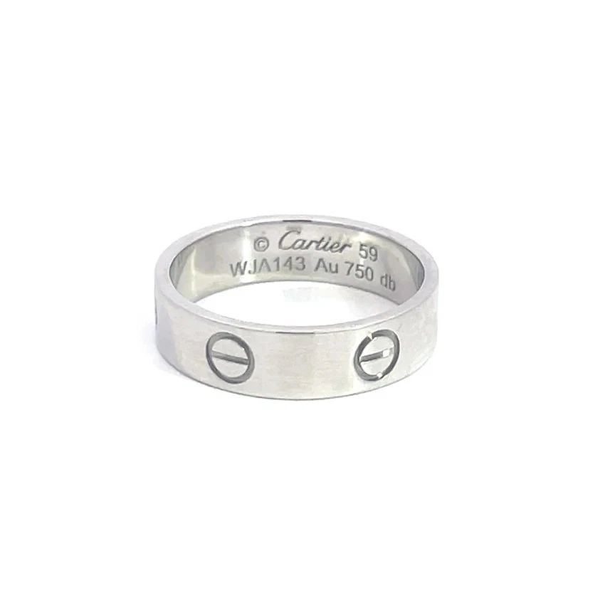 CARTIER LOVE GOLD RING 18K WHITE SCREW MOTIFS WIDE BAND SIZE 59: CARTIER LOVE GOLD RING 18K WHITE SCREW MOTIFS WIDE BAND SIZE 59 This elegant classic Cartier band is from the Love Collection, it is from 18k white gold show off a sophisticated and luxurious piece of