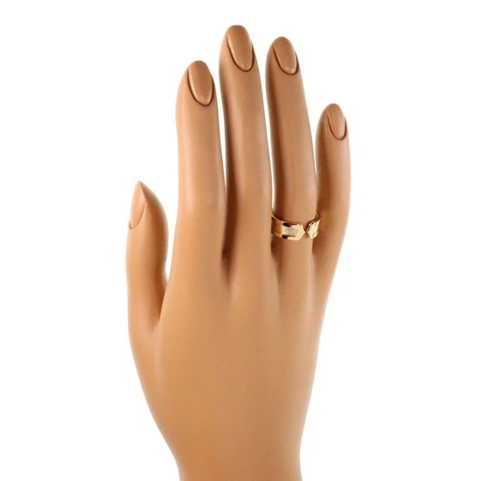 CARTIER DOUBLE C RING 18K YELLOW GOLD 6.5MM CUFF BAND SIZE 48 - US 5: CARTIER DOUBLE C RING 18K YELLOW GOLD 6.5MM CUFF BAND SIZE 48 - US 5 Cartier Double C 18k Yellow Gold 6.5mm Cuff Band Ring Size 48 - US 5 Description This authentic Cartier cuff band ring is finely cr