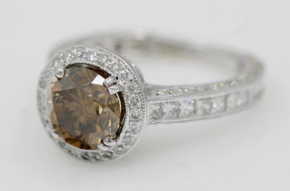 18K WHITE GOLD 4.50 TCW NATURAL CHOCOLATE DIAMOND HALO ENGAGEMENT RING SIZE 7: 18K WHITE GOLD 4.50 TCW NATURAL CHOCOLATE DIAMOND HALO ENGAGEMENT RING SIZE 7 Description 18K White Gold 4.50 TCW Natural Chocolate Diamond Halo Engagement Ring Ring is in good condition. May show sig