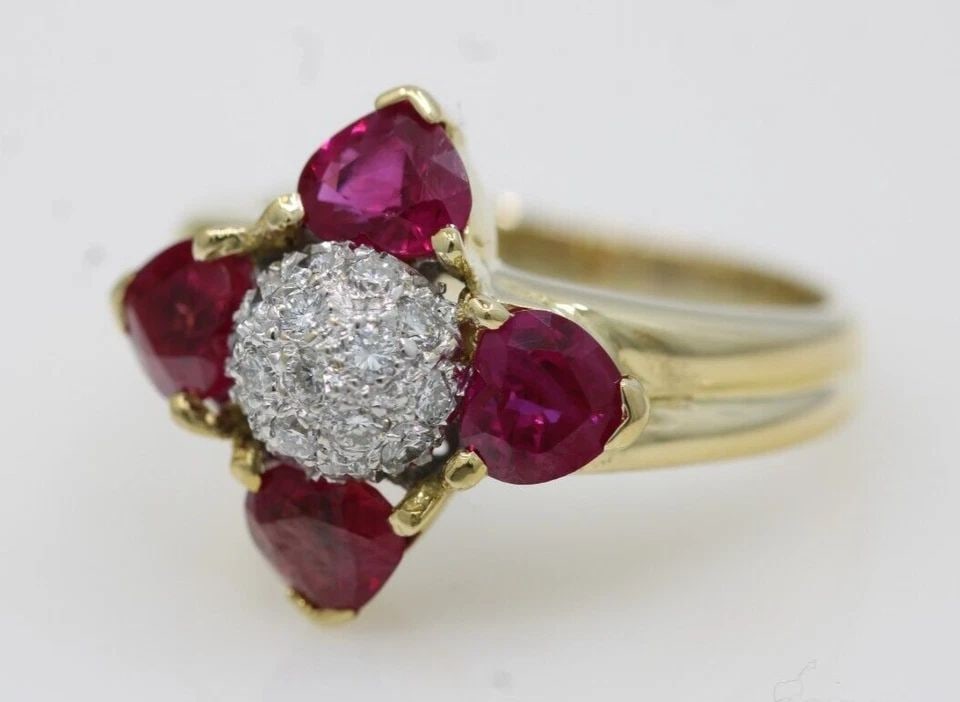 18K YELLOW GOLD NATURAL RUBY & DIAMOND FLOWER RING SIZE 5.5 - 6.3 GRAMS: 18K YELLOW GOLD NATURAL RUBY & DIAMOND FLOWER RING SIZE 5.5 - 6.3 GRAMS 18K YELLOW GOLD NATURAL RUBY & DIAMOND FLOWER RING SIZE 5.5 - 6.3 GRAMS Description 18K Yellow Gold Natural Ruby & Diamond Flowe