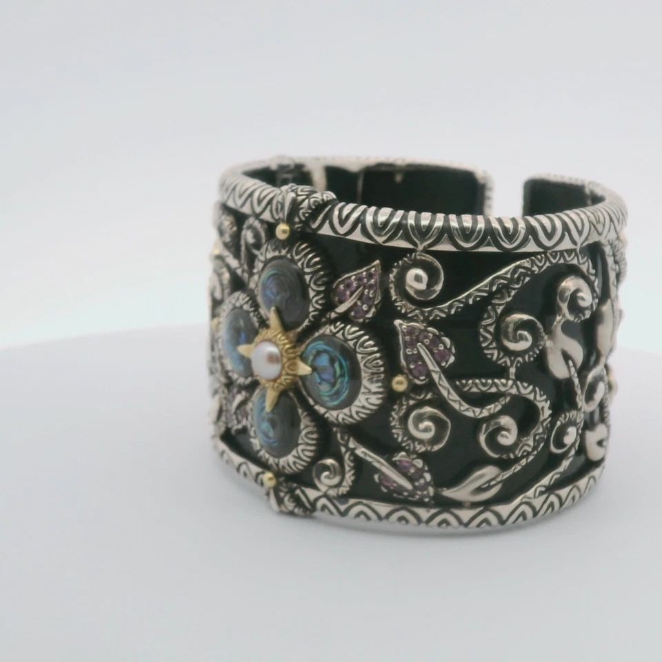 BARBARA BIXBY STERLING & 18K CASTLE GARDEN MULTI-GEMSTONE LEATHER CUFF BRACELET: BARBARA BIXBY STERLING & 18K CASTLE GARDEN MULTI-GEMSTONE LEATHER CUFF BRACELET Description Barbara Bixby Sterling & 18K Castle Garden Multi-Gemstone Leather Cuff Bracelet Item is in great condition. 