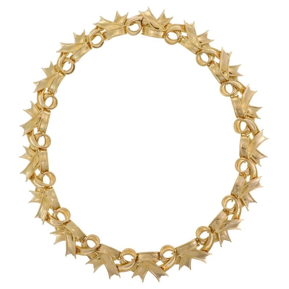 TIFFANY & CO. GOLD COLLAR NECKLACE VINTAGE 18K YELLOW RIBBON BOW 139 GRAMS: TIFFANY & CO. VINTAGE 18K YELLOW GOLD RIBBON BOW LINK COLLAR NECKLACE 139 GRAMS Tiffany & Co. Vintage 18k Yellow Gold Ribbon Bow Link Collar Necklace 139 grams Description This gorgeous eye-catching v