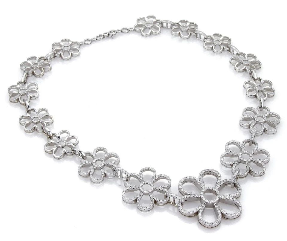 DIAMOND GOLD NECKLACE 18K WHITE LARGE GRADUATED FLORAL LINKS COLLAR STYLE: DIAMOND GOLD NECKLACE 18K WHITE LARGE GRADUATED FLORAL LINKS COLLAR STYLE This is a magnificent eye-catching floral necklace. Forged from 18k white gold with a polished finish, it is pure luxury with 