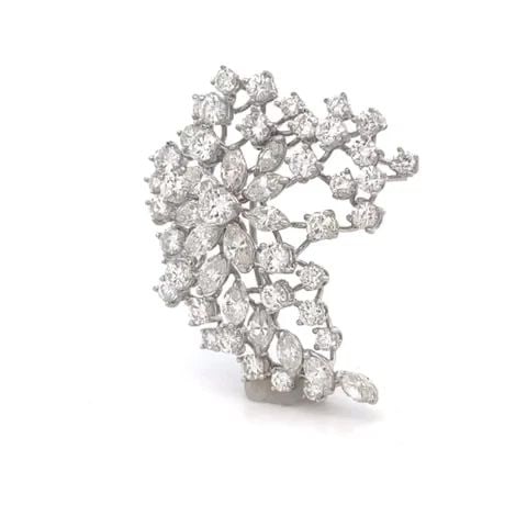 PLATINUM GOLD 7.5CT DIAMOND FLORAL SPRAY BROOCH/PENDANT: PLATINUM GOLD 7.5CT DIAMOND FLORAL SPRAY BROOCH/PENDANT This is a magnificent platinum spray shape frame in a wide to a small, curved shape, the center of the brooch has a larger prong set round diamo