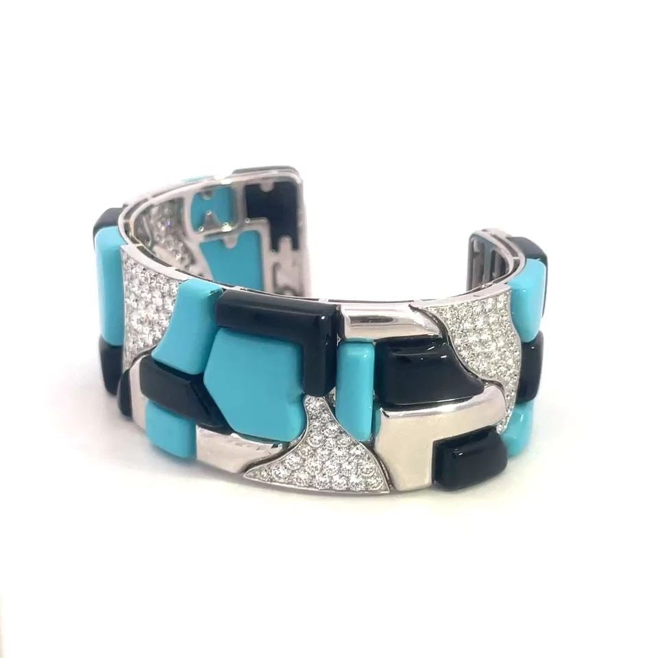 GEORLAND DIAMOND GEMS 18K BRACELET WHITE GOLD CUFF WIDE BAND FRANCE: GEORLAND DIAMOND GEMS 18K BRACELET WHITE GOLD CUFF WIDE BAND FRANCE This is a gorgeous cuff bracelet by Georland Paris, it is crafted from 18k white gold featuring a 25mm wide cuff band with assorted 