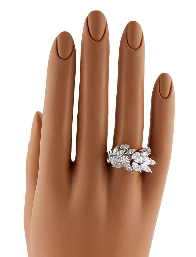 DIAMOND PLATINUM RING 2.99 CARATS MARQUISE & BAGUETTE FLORAL: DIAMOND PLATINUM RING 2.99 CARATS MARQUISE & BAGUETTE FLORAL This stunning Diamond Platinum Ring features marquise and baguette diamonds in a floral design. The main stone is a natural white diamond w
