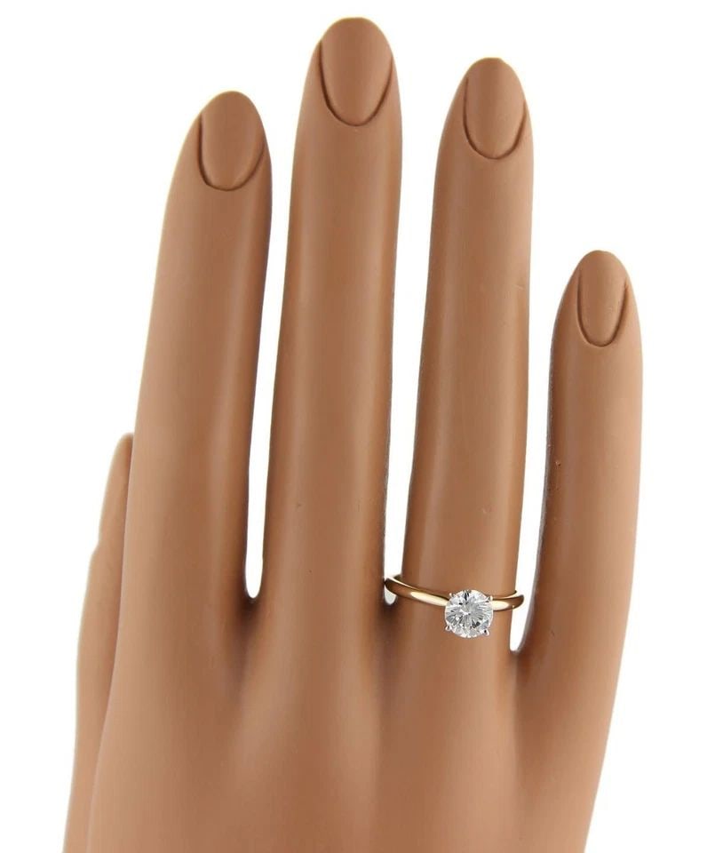 ROUND CUT 1.00CT ENGAGEMENT RING J VS1 SOLITAIRE DIAMOND 14K GOLD W/GIA CERT.: ROUND CUT 1.00CT ENGAGEMENT RING J VS1 SOLITAIRE DIAMOND 14K GOLD W/GIA CERT. This product is a stunning round cut diamond 1.00ct engagement ring featuring a J VS1 solitaire set in 14k gold with a GIA