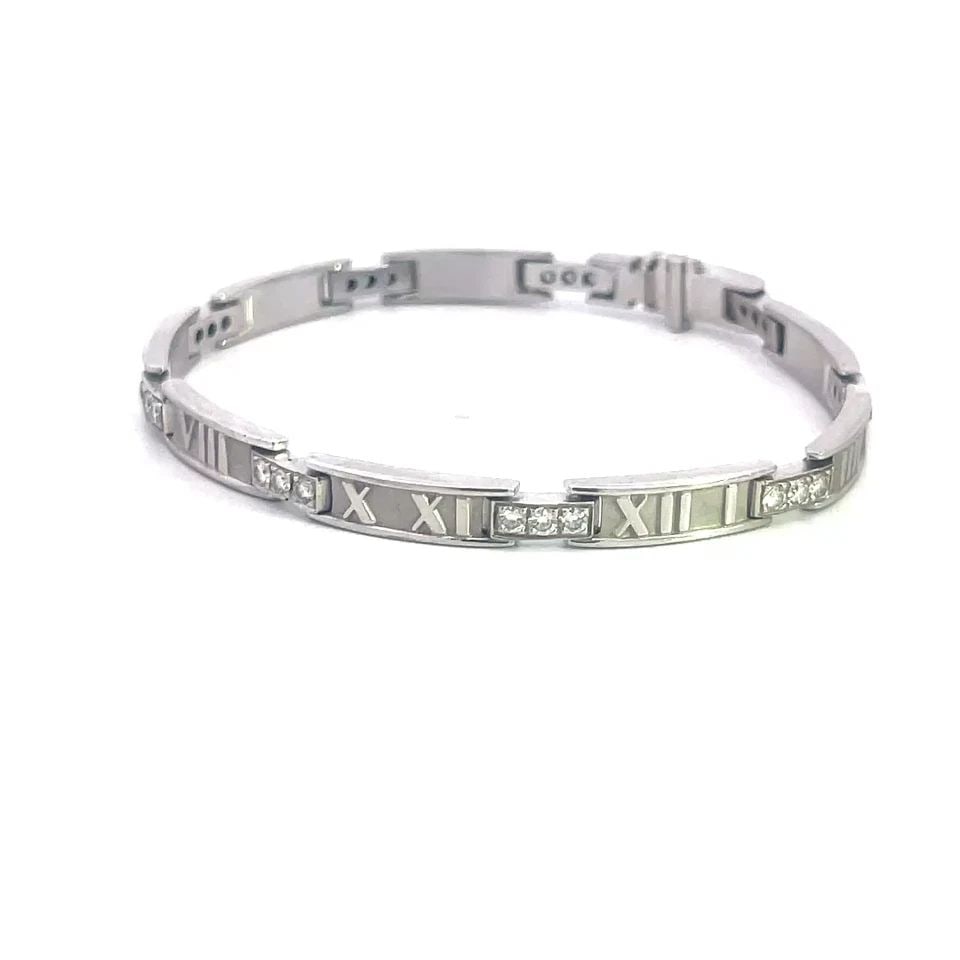 70720 TIFFANY & CO. ATLAS GOLD BRACELET DIAMOND 18K WHITE ROMAN NUMERAL LINKS: 70720 TIFFANY & CO. ATLAS GOLD BRACELET DIAMOND 18K WHITE ROMAN NUMERAL LINKS Elevate your jewelry collection with this Tiffany & Co. gorgeous bracelet from the Atlas Collection. It features a classic
