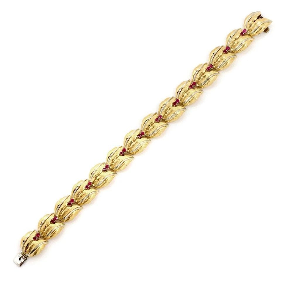 SPRITZER & FURMAN 1.00CT RUBY 18K YELLOW GOLD LEAF LINK BRACELET: SPRITZER & FURMAN 1.00CT RUBY 18K YELLOW GOLD LEAF LINK BRACELET Spritzer & Furman 1.00ct Ruby 18k Yellow Gold Leaf Link Bracelet Description This beautiful authentic bracelet is from Spritzer & Furma