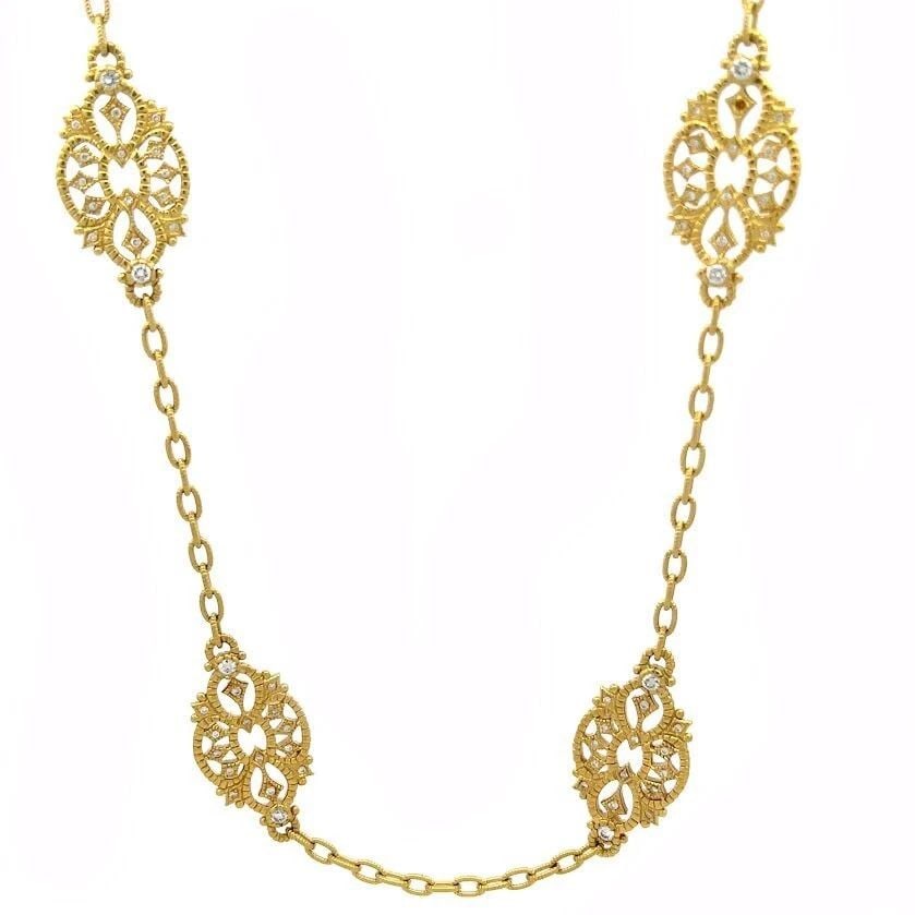 JUDITH RIPKA DIAMOND NECKLACE 18K YELLOW GOLD 6 FLORAL MOTIFS: JUDITH RIPKA DIAMOND NECKLACE 18K YELLOW GOLD 6 FLORAL MOTIFS This beautiful long authentic necklace is by Judith Ripka, it is crafted from 18k yellow gold featuring a fine textured oval link chain wi