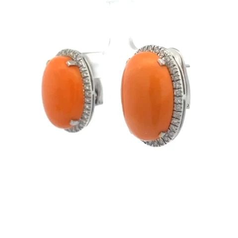 CORAL DIAMOND GOLD EARRINGS 1.5CT WHITE OVAL HALLO POST CLIP STYLE: CORAL DIAMOND GOLD EARRINGS 1.5CT WHITE OVAL HALLO POST CLIP STYLE These sophisticated pair of earrings are crafted from 18k white gold with over an inch long oval shape frame with bezel set diamond h