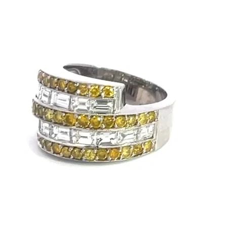 DIAMOND GOLD BYPASS RING YELLOW & WHITE 18K 5 ROW DESIGN BAND: DIAMOND GOLD BYPASS RING YELLOW & WHITE 18K 5 ROW DESIGN BAND This is a gorgeous band ring; it is crafted from 18k white gold with a polished finish. The front half of the band has a bypass style with
