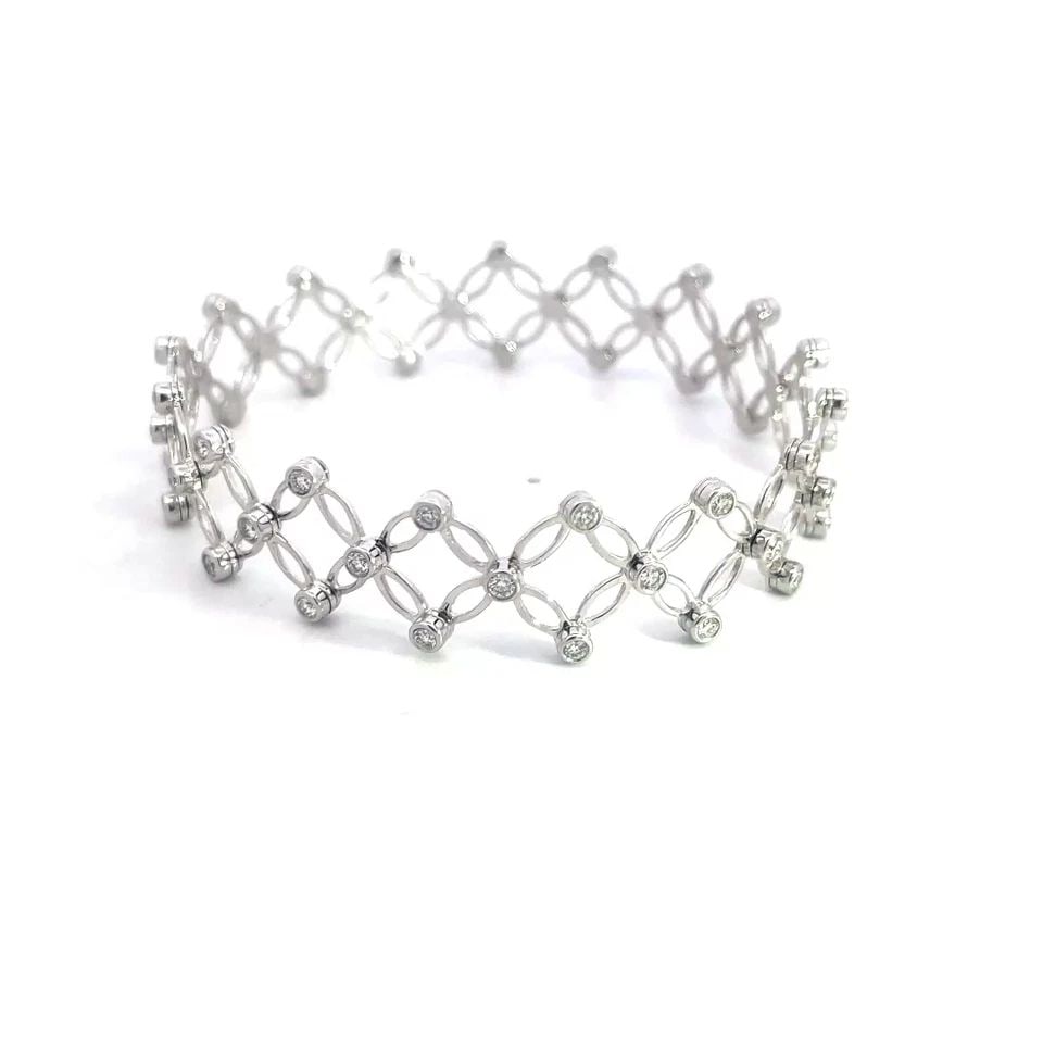 AFARIN GOLD CONVERTIBLE RING BRACELET 18K WHITE DIAMOND BAND: AFARIN GOLD CONVERTIBLE RING BRACELET 18K WHITE DIAMOND BAND This is a beautiful convertible bracelet to ring by designer Afarin, it is crafted from 18k white gold featuring a four petals star like fl