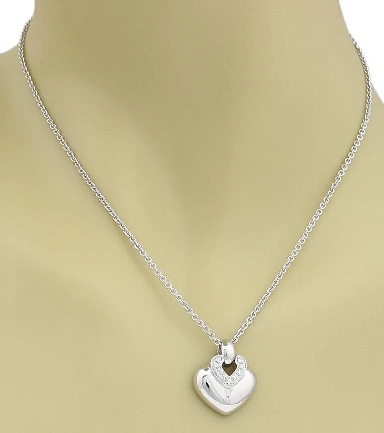 BULGARI DIAMOND GOLD NECKLACE 18K WHITE PUFFED HEART PENDANT: BULGARI DIAMOND GOLD NECKLACE 18K WHITE PUFFED HEART PENDANT This is a lovely authentic heart pendant and chain necklace from Bulgari, well-crafted from 18k white gold with a high polished finish. The