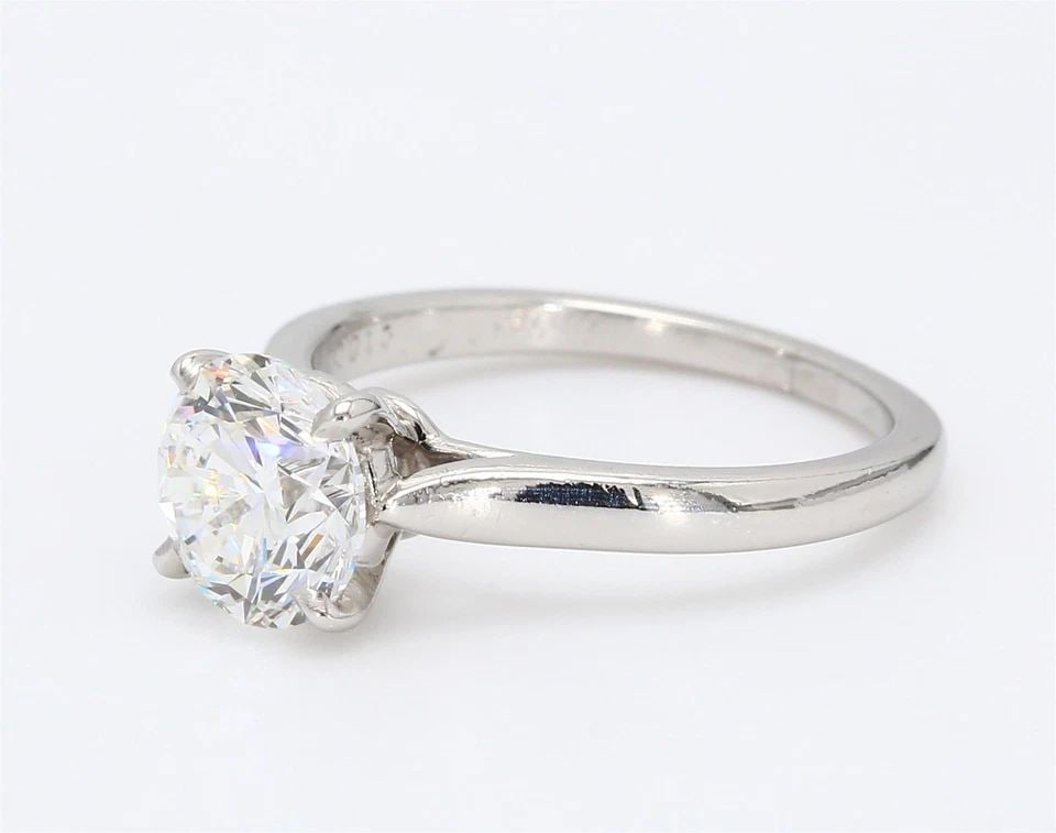 CARTIER 1.53 CARAT ROUND BRILLIANT SHAPE E-VS1 DIAMOND PLATINUM ENGAGEMENT RING: CARTIER 1.53 CARAT ROUND BRILLIANT SHAPE E-VS1 DIAMOND PLATINUM ENGAGEMENT RING Title: Cartier 1.53 Carat Round Brilliant Shape E-VS1 Diamond Platinum Engagement Ring Style: Engagement Metal: Platinum