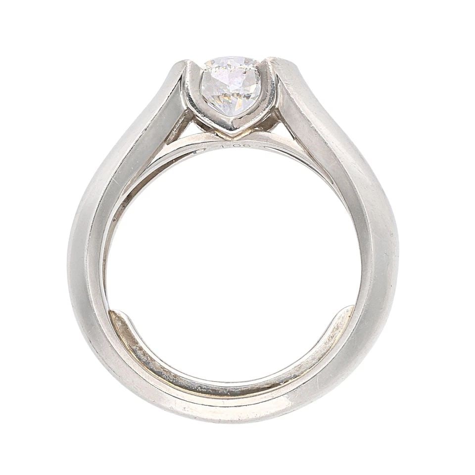 CARTIER 1.06 CARAT F-VVS1 DIAMOND PLATINUM ENGAGEMENT RING: CARTIER 1.06 CARAT F-VVS1 DIAMOND PLATINUM ENGAGEMENT RING Title: Cartier 1.06 Carat Round Brilliant Shape F-VVS1 Diamond Platinum Engagement Ring Style: Engagement Metal: Platinum Gemstone 1: 1.06 Ca