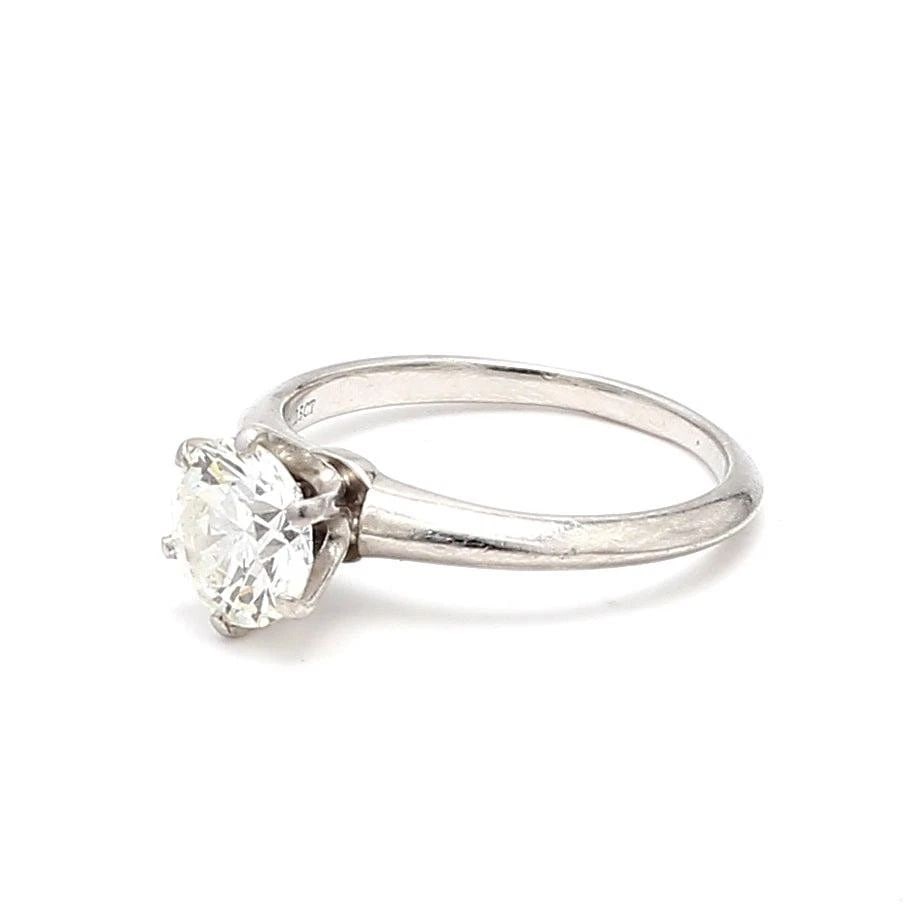 TIFFANY AND CO 1.25 CARAT ROUND BRILLIANT H-VS1 PLATINUM ENGAGEMENT RING: TIFFANY AND CO 1.25 CARAT ROUND BRILLIANT H-VS1 PLATINUM ENGAGEMENT RING Title: Tiffany and Co 1.25 Carat H-VS1 Platinum Engagement Ring Style: Engagement Metal: Platinum Gemstone 1: 1.25 Carat Diamon
