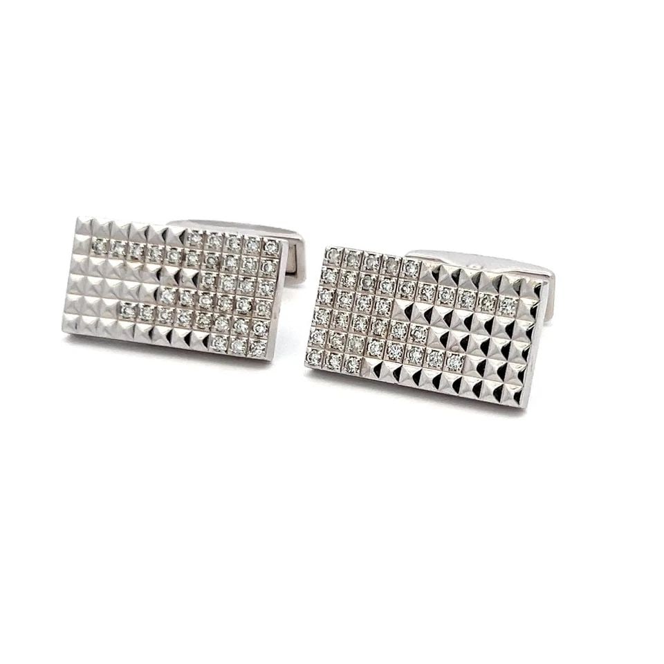 S.T DUPONT 18K WHITE GOLD WHALE BACK CUFFLINKS WITH 0.66 CARAT ROUND DIAMONDS: S.T DUPONT 18K WHITE GOLD WHALE BACK CUFFLINKS WITH 0.66 CARAT ROUND DIAMONDS Designer: S.T DUPONT Video: Video Link Detailed Description: Elevate your style with these sophisticated 18 Karat White Go