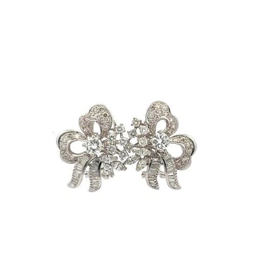 3.53CT DIAMOND FLORAL CLIP-ON EARRINGS IN 18K WHITE GOLD, ROUND & BAGUETTE MIX: 3.53CT DIAMOND FLORAL CLIP-ON EARRINGS IN 18K WHITE GOLD, ROUND & BAGUETTE MIX PRODUCT DESCRIPTION Title: These exquisite vintage clip-on earrings showcase a dazzling 3.53 carats of mixed-cut diamonds
